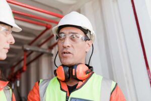 leadership engaging in a discussion with an employee