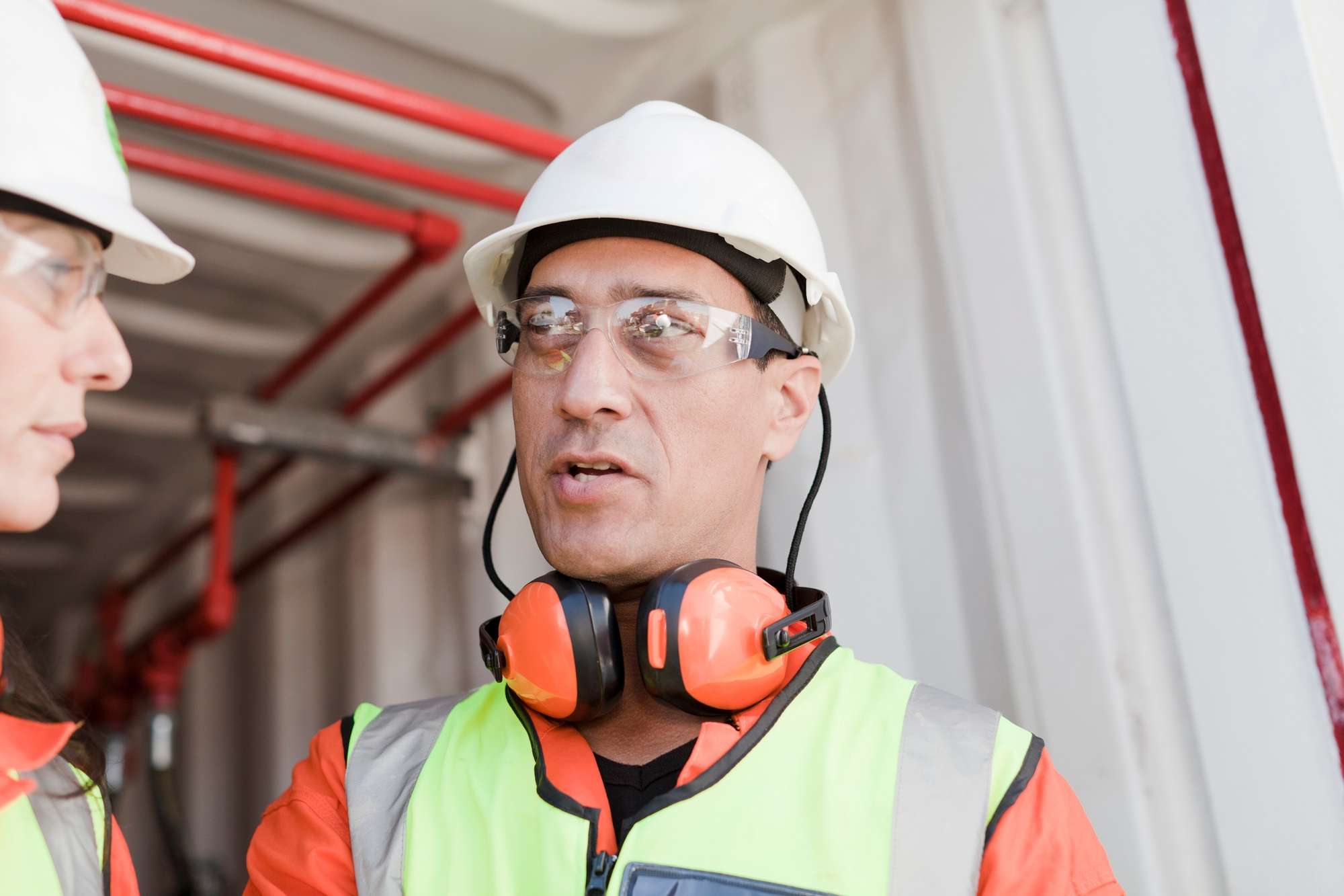 leadership engaging in a discussion with an employee